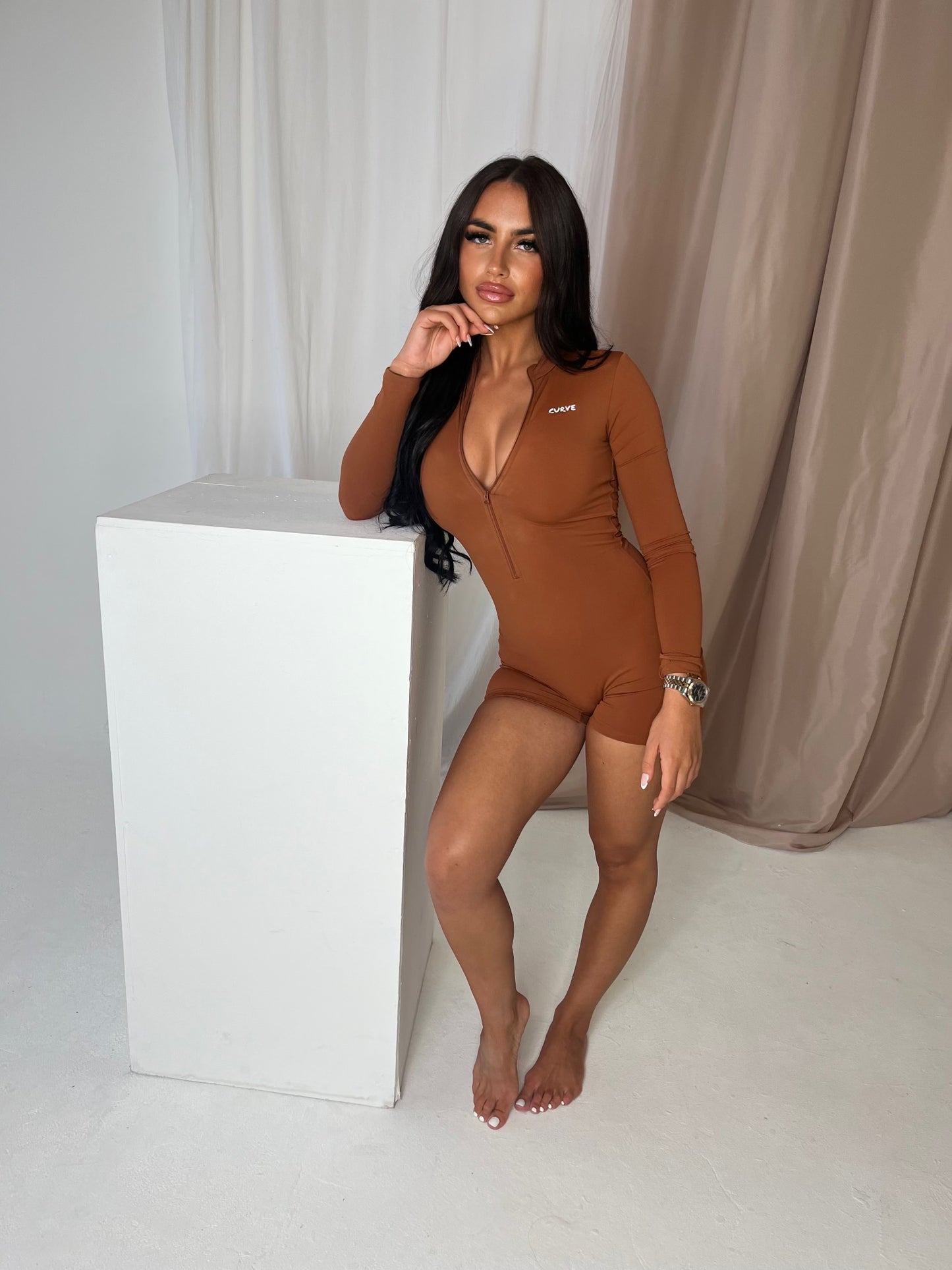 Brown long sleeved fitness playsuit